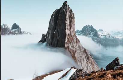 Majestic Mountain Peak Above the Clouds